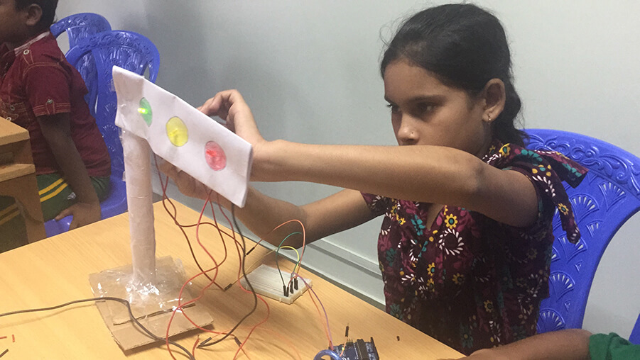 Children making traffic light with Arduino